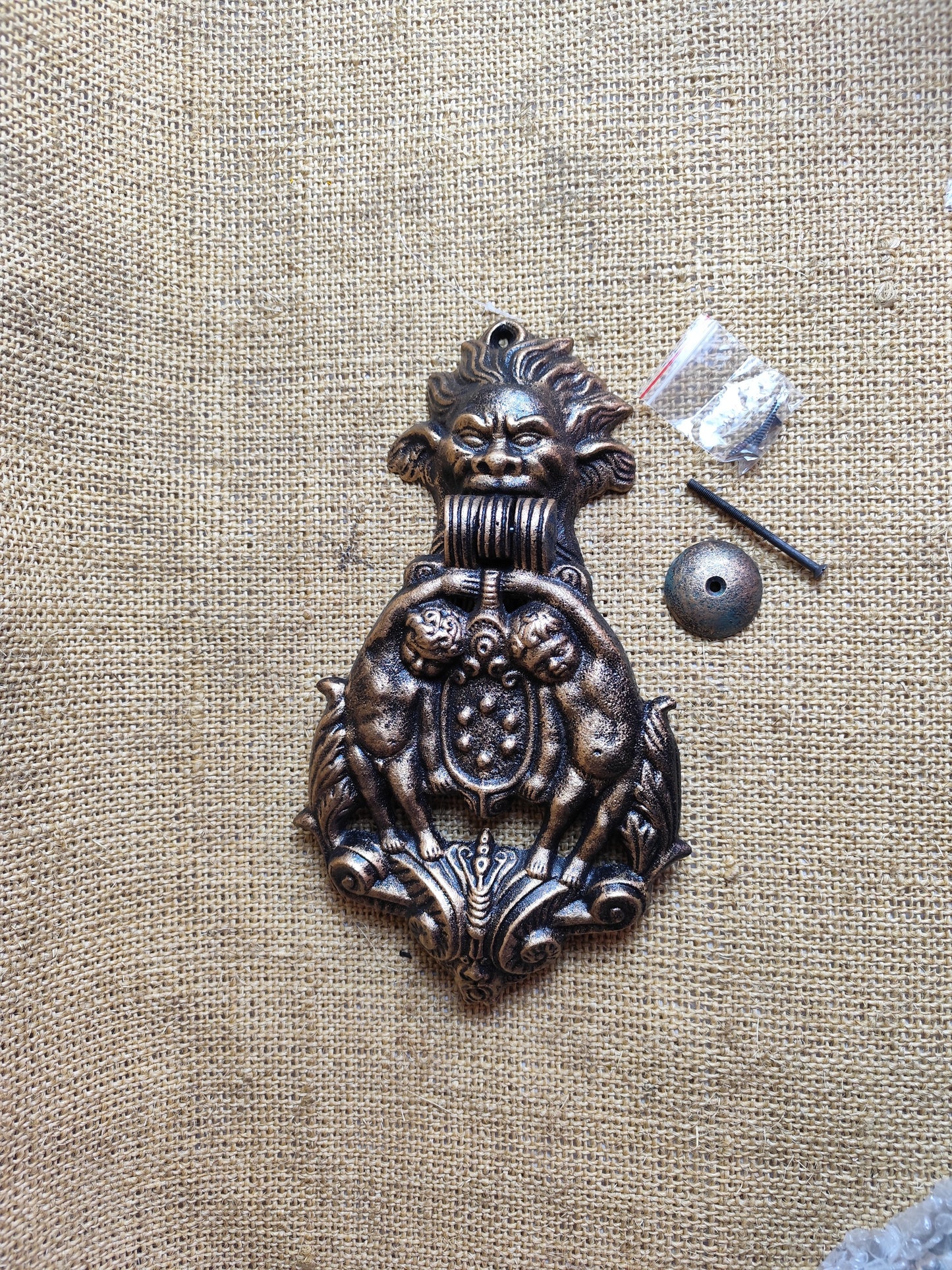 Cherub and Face Doorknocker