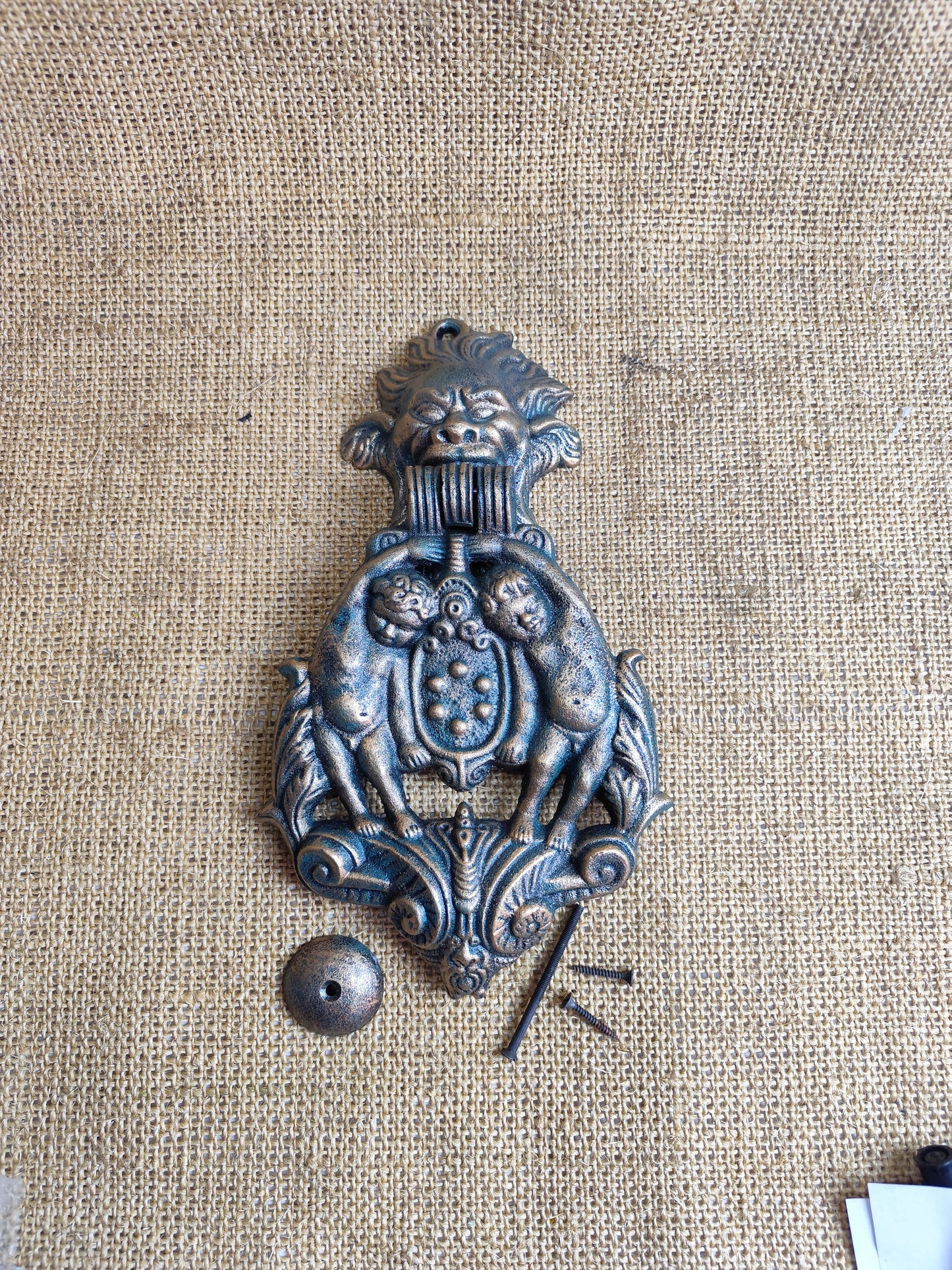 Cherub and Face Doorknocker