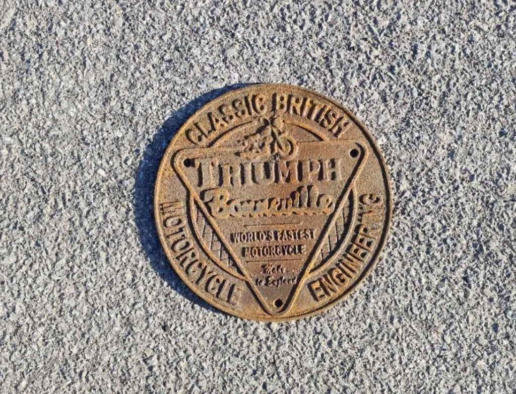 Triumph Sign