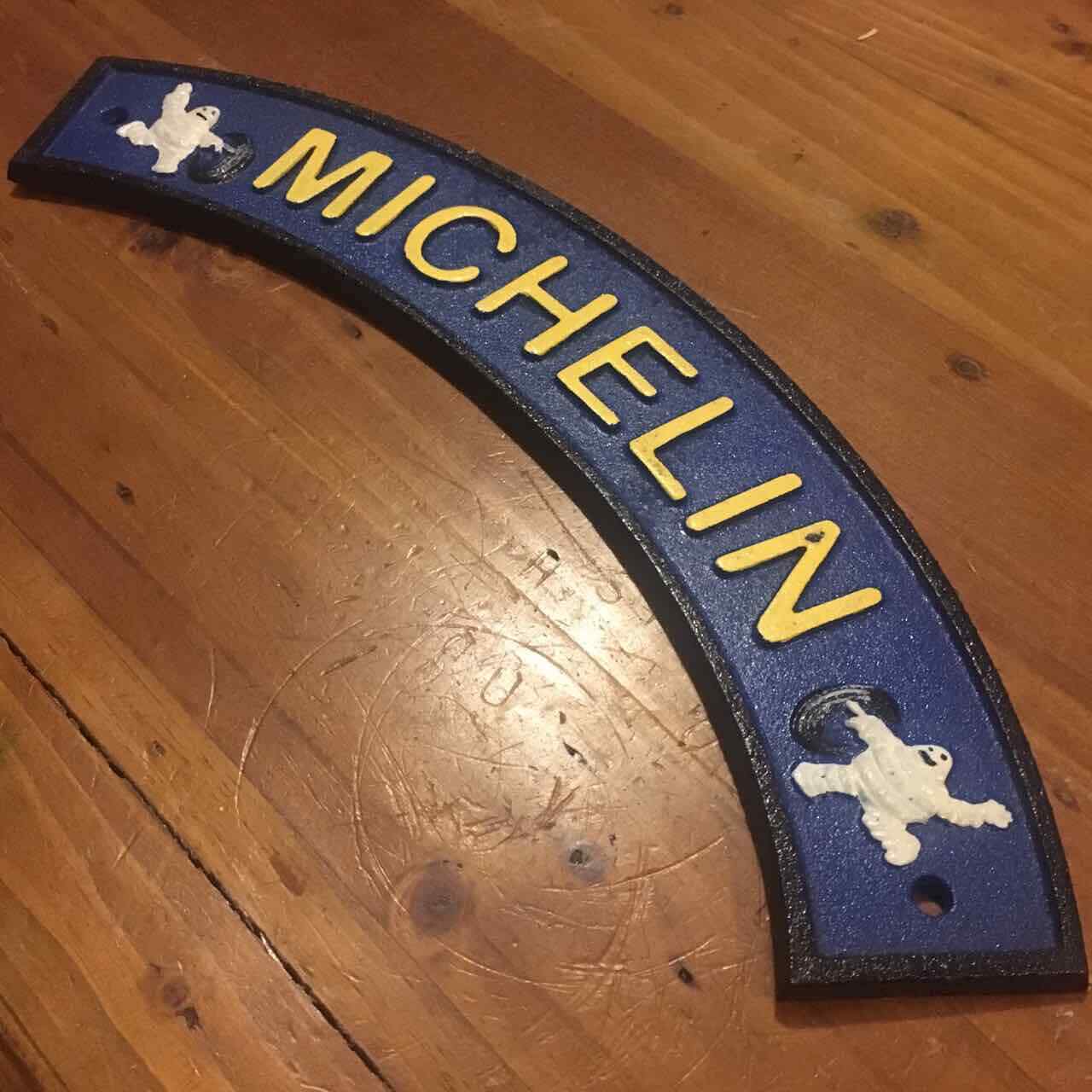 Curved Tire Man Sign 41CM