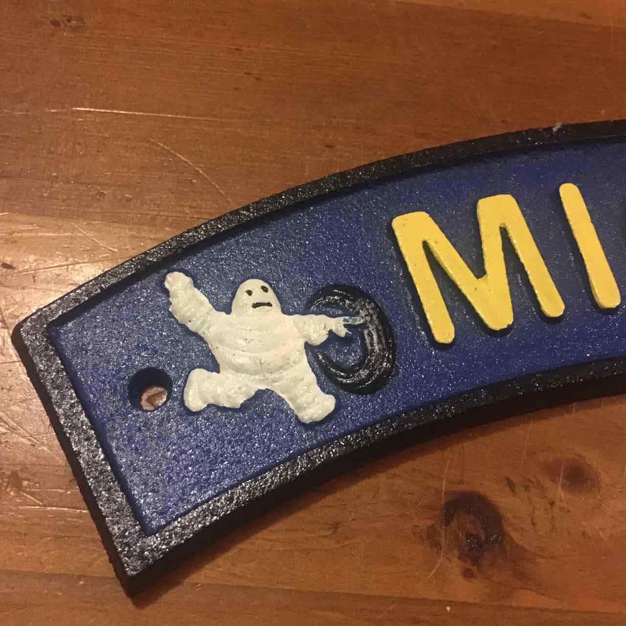 Curved Tire Man Sign 41CM